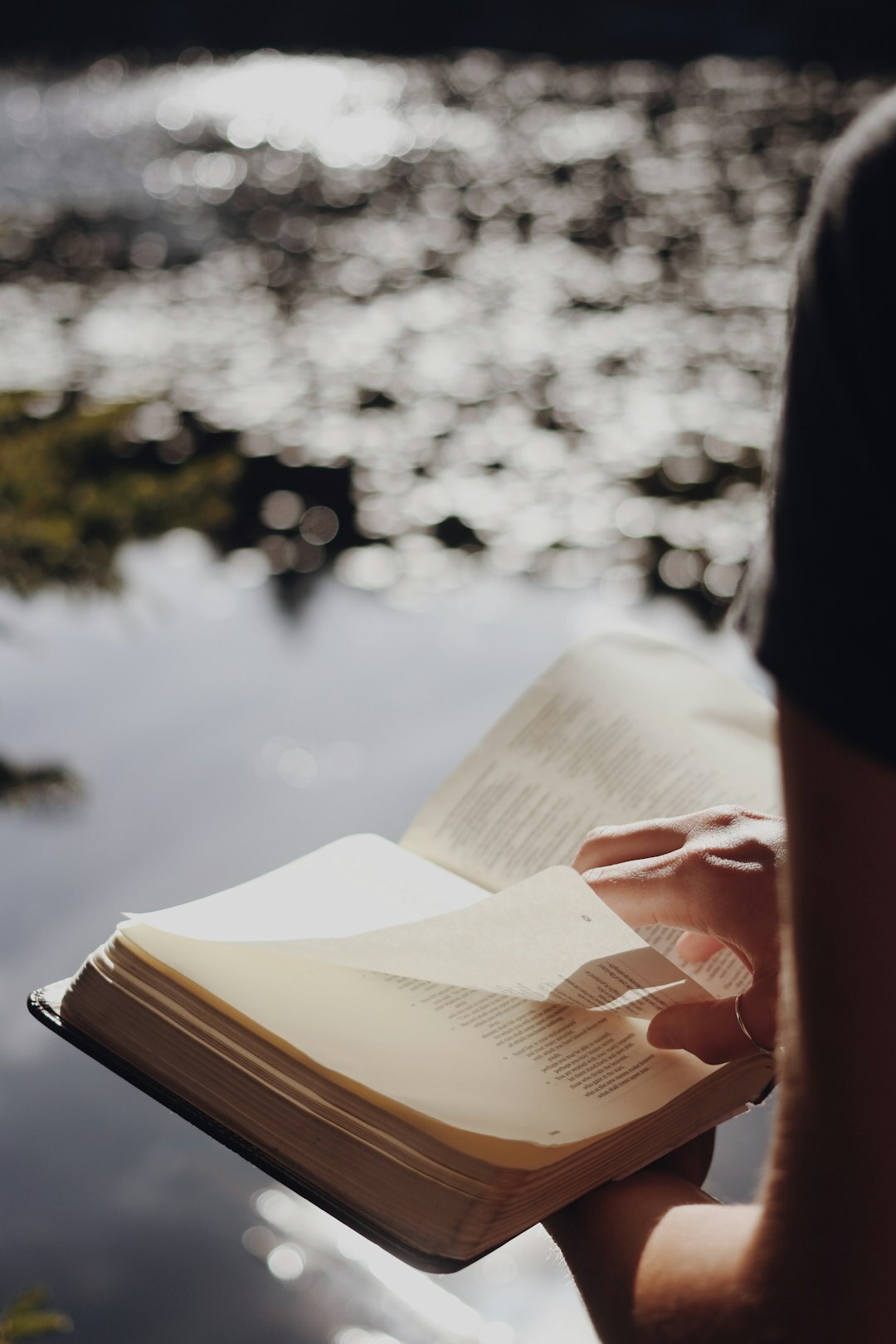 person reading mystery novel
