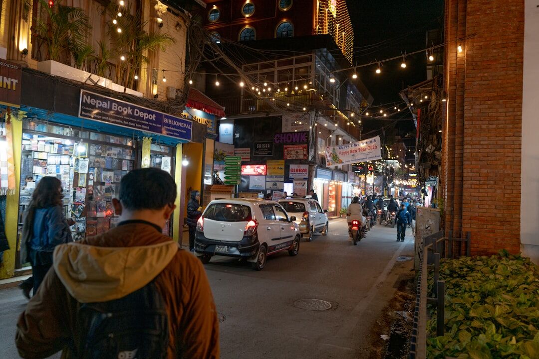 person reading book at night
