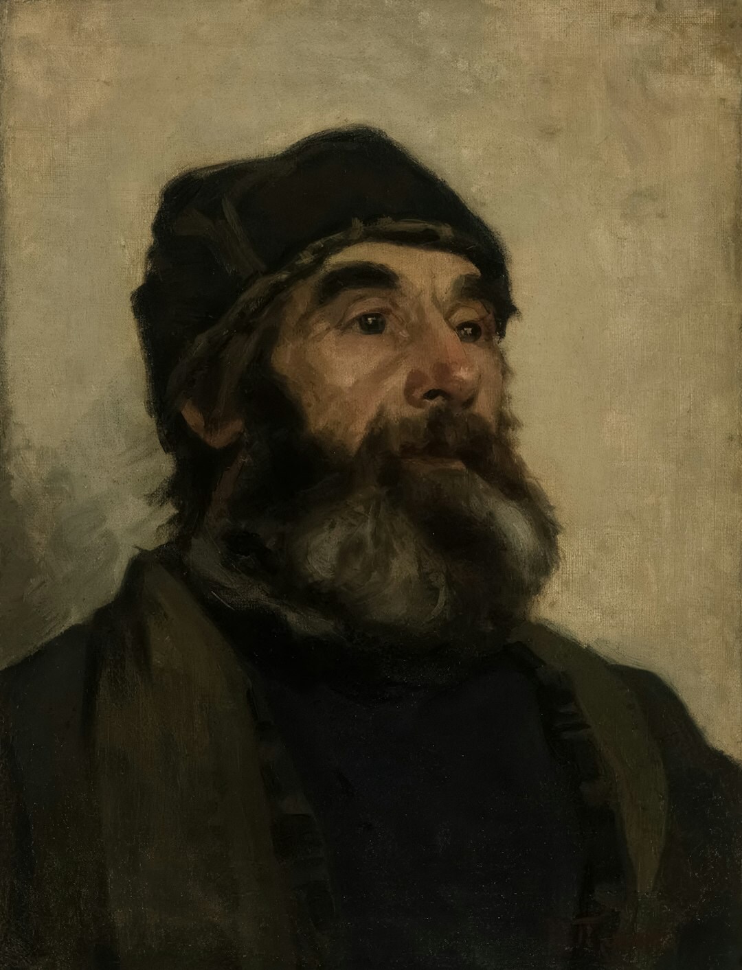 Studio portrait of a Croatian mystery novelist in his fifties wearing a dark coat
