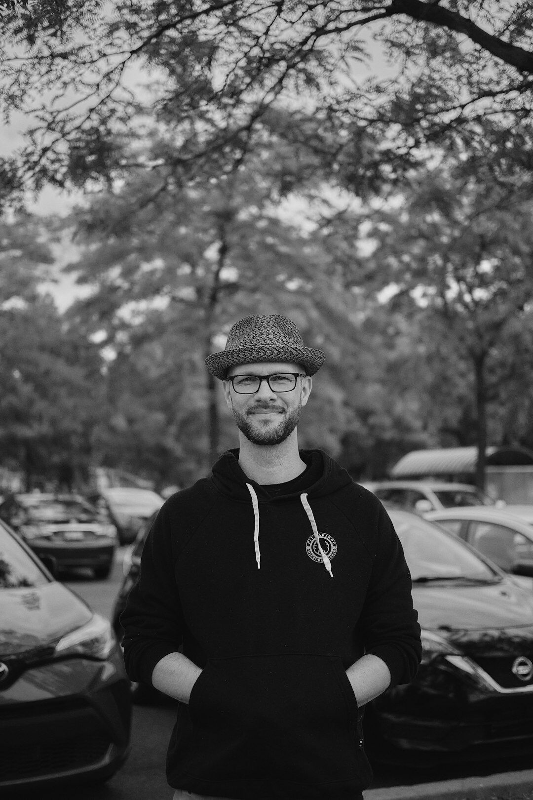 Studio portrait of a Croatian male book editor in a knit sweater